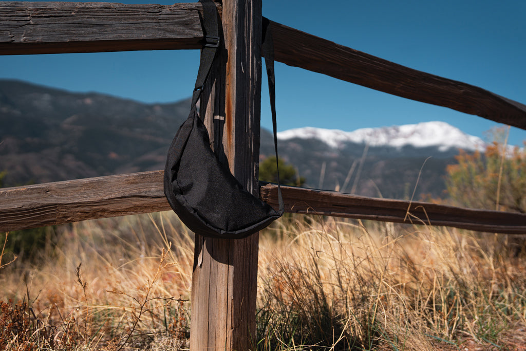 Crescent AWARE™ RPET half moon sling bag - Black